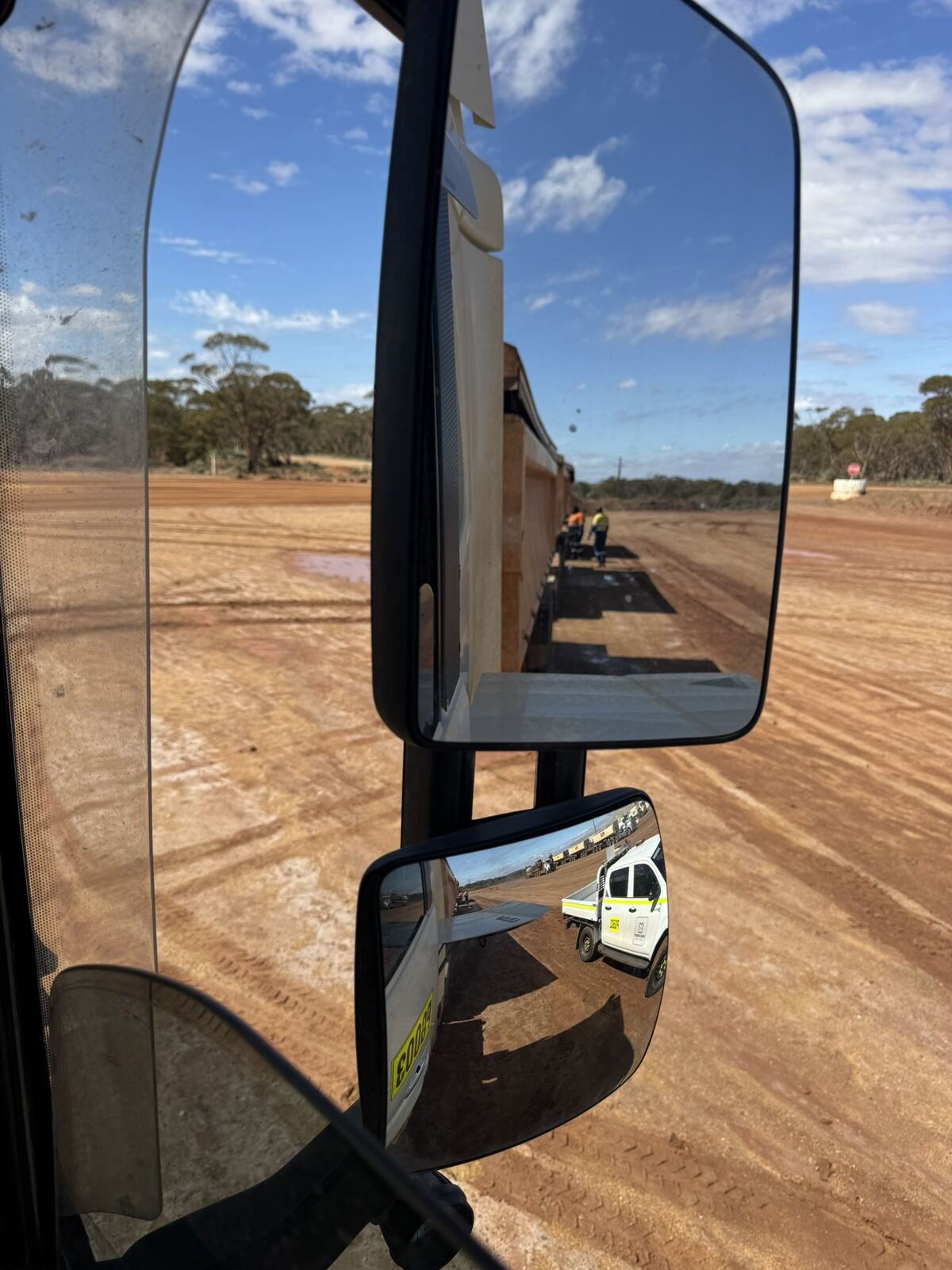 View along a road train from the driver's mirror